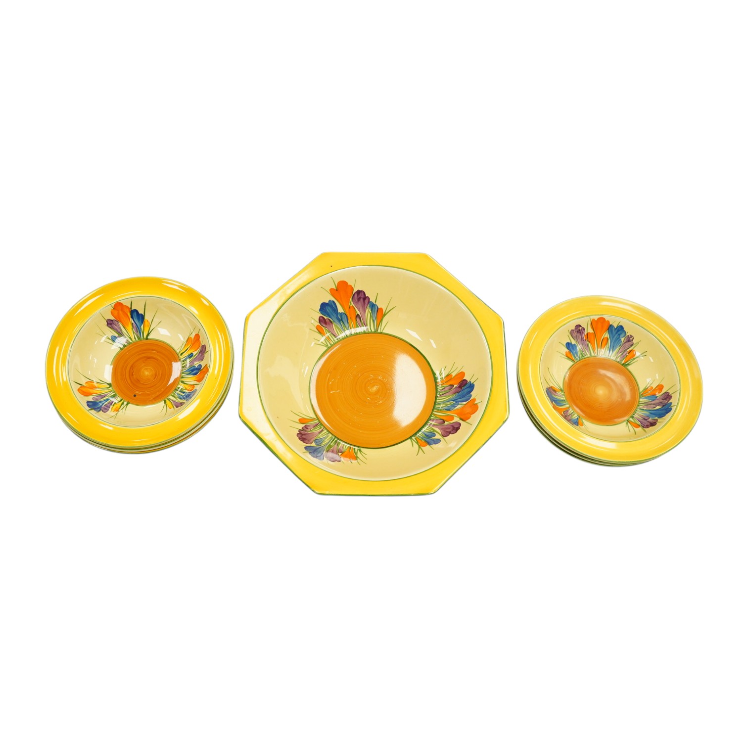 A Clarice Cliff Crocus pattern octagonal bowl and set of six dishes, largest 23cm wide. Condition - good